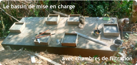 Le bassin de mise en charge avec chambres de filtration